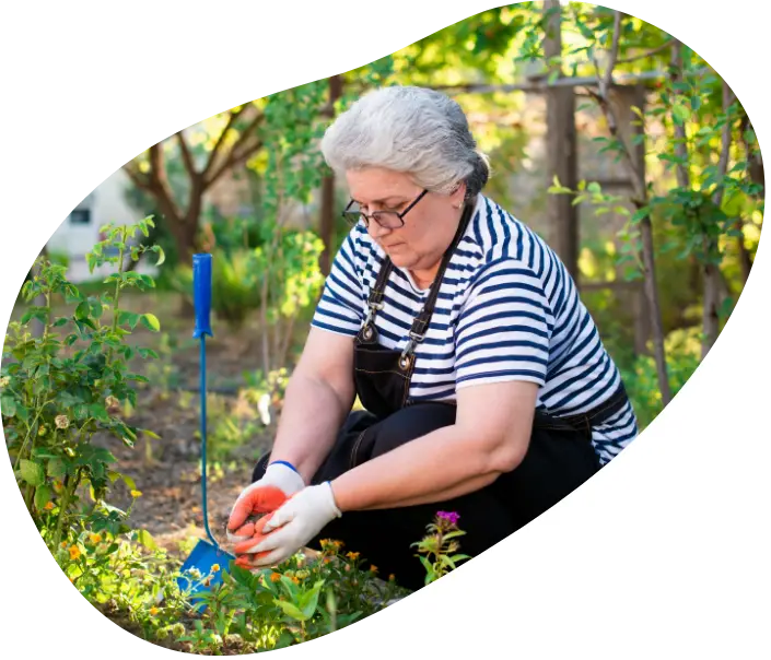 GartenbesitzerInnen Frau in Garten